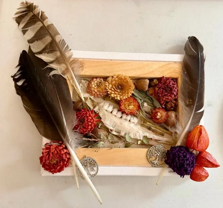 A piece of Sasha's multimedia art, with feathers.